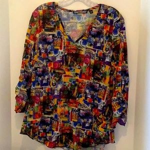 SNO SKINS  Woman’s Top in size L.